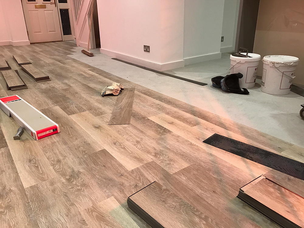 Supply & install of Karndean Knight Tile KP99 Limed Washed Oak luxury vinyl tile on Karndean Universal adhesive as recommended.