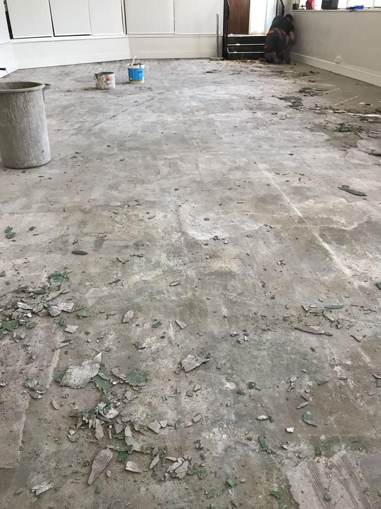 Uplift and disposal of existing flooring for health club in Chertsey