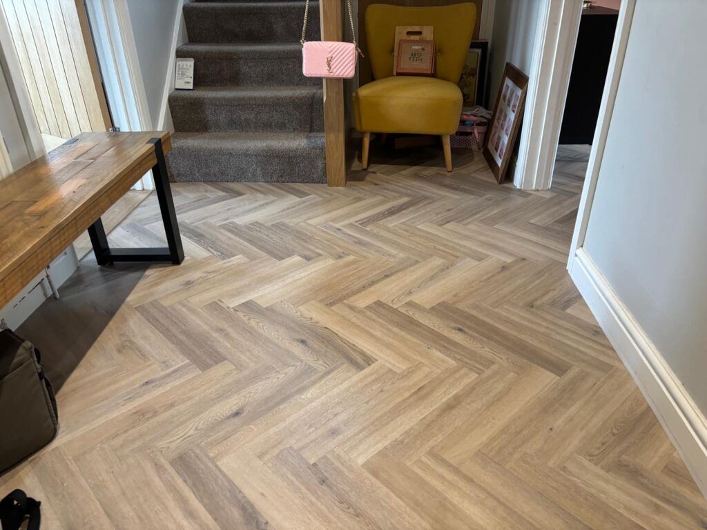 carmaro oak herringbone flooring in the hallway