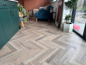 kitchen herringbone lvt flooring by Fineline Flooring