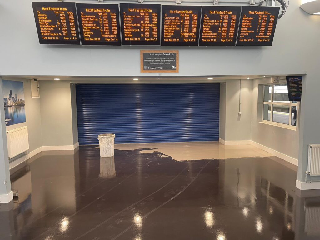 Near completion of damp proof membrane application in Southampton train station